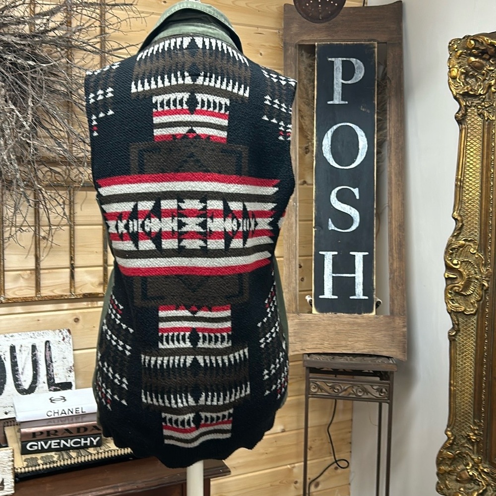 Army green vest with Aztec print at back